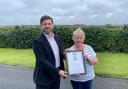 MP Stephen Crabb presents Edna with her NFU Community Hero award