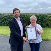 MP Stephen Crabb presents Edna with her NFU Community Hero award
