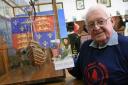 David James with his previous book Ye Mary Fortune and a model of the ship he constructed. PICTURE: Martin Cavaney