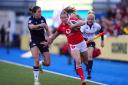 STARTER: Wing Carys Cox lines up for Wales against England