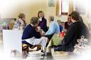The community cafe offers hot drinks and home baked goods every Friday.