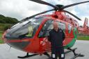 Wales Air Ambulance pilot James Greenfell with the new helicopter
