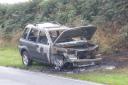 The remains of the burnt out Land Rover Freelander on Tuesday morning