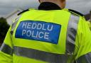 Emergency services were called to reports of a man falling from a roof in Tenby.