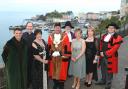 Tenby's new mayor, Councillor Laurence Blackhall, is pictured with town clerk Andrew Davies, chaplain Canon Andrew Grace, deputy mayor Sue Lane, mace bearer John Morgan, mayoress Samantha Skyrme, deputy mayoress Sian Waters and town crier Teifion