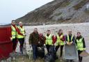 Simon Hart MP with staff and volunteers from the National Trust and ranger Carol Bailey clear up at Morfa Bychan, near Pendine.