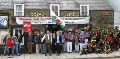 The official opening of the 2011 Fishguard Folk Festival outside the Royal Oak pub in the centre of town. 