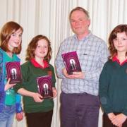 Author Derek Webb from Clynderwn is launching his new book with a dramatisation read by Megan Thomas, Rebecca Aubrey, and Emily Aubrey.