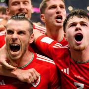Gareth Bale, left, celebrates scoring Wales' equaliser in their 1-1 World Cup draw against the United States