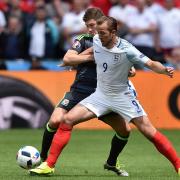 England’s Harry Kane (right) and Wales’ Ben Davies in action against each other at Euro 2016