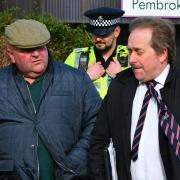 Sean Burns (left) leaves Haverfordwest magistrates court after a hearing in 2020 alongside his then solicitor Aled Owen