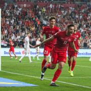 Turkey’s Umut Nayir celebrates opening the scoring against Wales (Murat Akbas/Dia Images via AP)