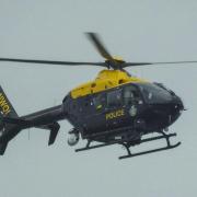 A police helicpoter spotted searching over Dinas Mountain was looking for a missing person.