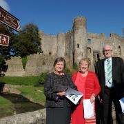 Street scheme: Looking at plans for Laugharne's Streetscape scheme are local member, Councillor Jane Tremlett, and senior Carmarthenshire County Council members, Councillor Meryl Gravell and Councillor Jim Jones.
PICTURE: Jeff Connell.
 (2865051)