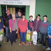Youngsters from POINT are pictured with County Councillor Pat Davies ahead of the Town Council meeting.