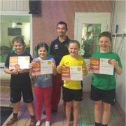 Rookie lifesavers Lewis, Celyn, Rosie and James who gained awards, along with Michael, are pictured with lifeguard trainer Angelo Fecci.