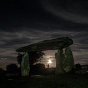 Cloudy moonrise at Pentre Ifan Burial Chamber by Camera Club member Keith D Small