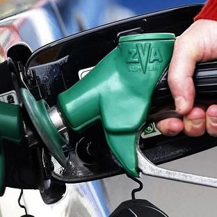 George Osborne says scrapping the planned 3p fuel duty rise will help financial recovery 'at this difficult economic time'