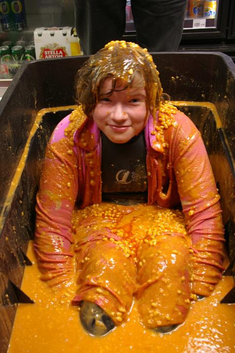 HANNAH DUDLEY of Hodgeston bathed in a bath of beans for three hours on Saturday November 10th, at Lamphey Garage and Spar and raised a grand total of £285.40.