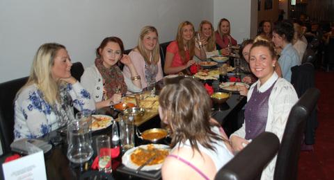 Milford Haven School 6th form students enjoy  a ‘Chindian’ meal.