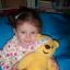 In her spotty pyjamas is two-year-old Kayla Kemp from Honeyborough with Pudsey.