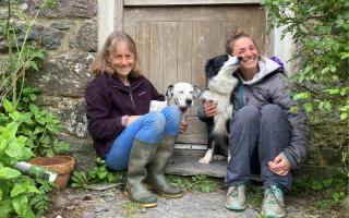 A welcome home for Willow, pictured right with Ella, her mum Kath and doggy pal Hannah.
