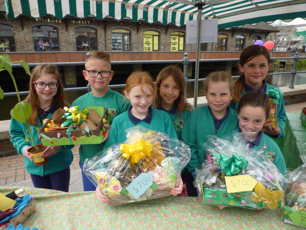 Enterprising youngsters from Golden Grove School show off their wares.