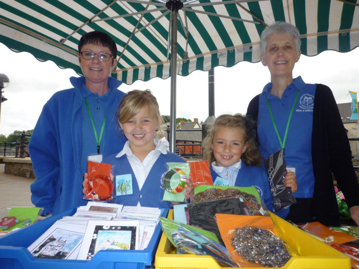 Melanie and Eva Louise from Tenby Infants School were hard at work selling upcycled jewellery and art cards.