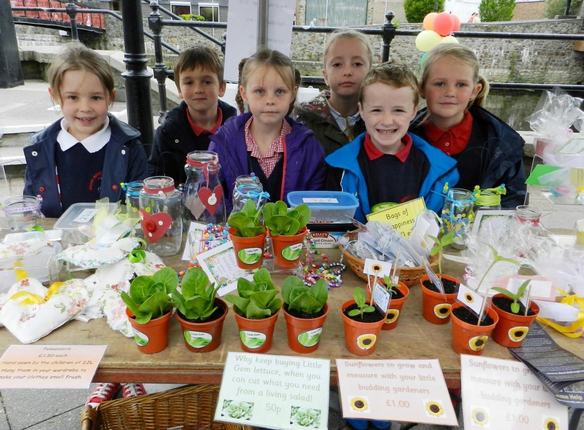 Pupils from year 2 at the Meads Infant and Nursery School were selling sunflowers to grow from seed, lettuce plants, bath salts home made soap, pomanders, photo frames and more...