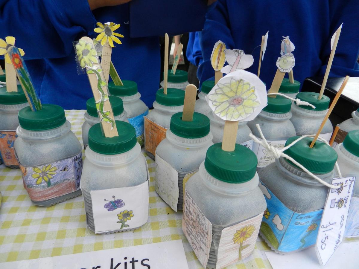 Nine and ten year olds from Cleddau Reach School were selling Grow Your Own Sunflowers in handily recycled milk bottles, doorstops, lavender, pebble ornaments, and canvas bags and T-shirts with designs inspired by artists including William Morris. 
