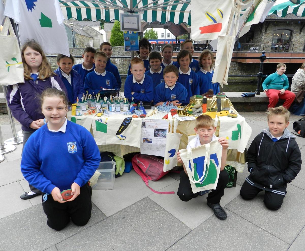 Nine and ten year olds from Cleddau Reach School were selling Grow Your Own Sunflowers, doorstops, lavender, pebble ornaments, and canvas bags and T-shirts with designs inspired by artists including William Morris.