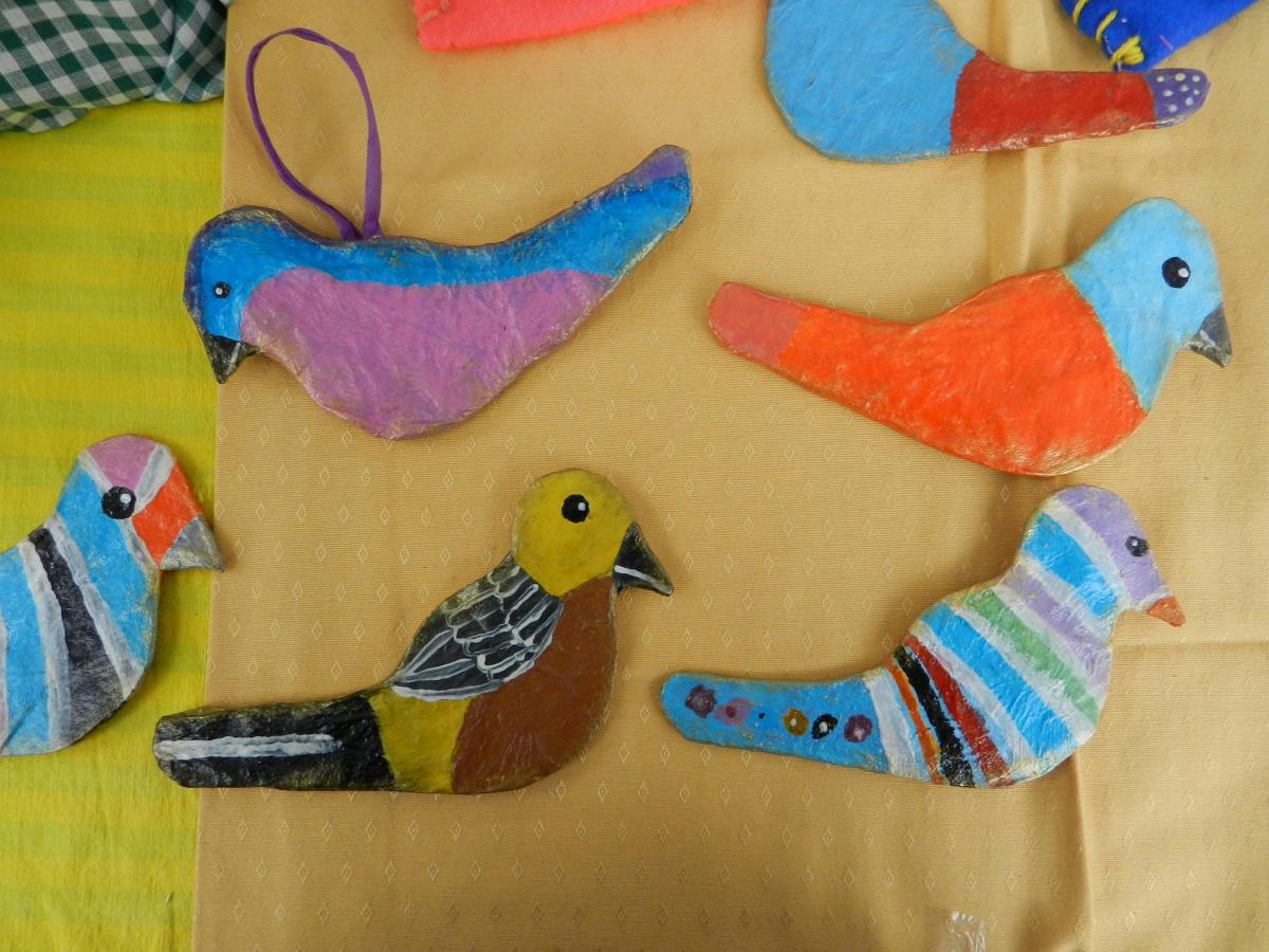 Colourful birds on the St Mary's School stall