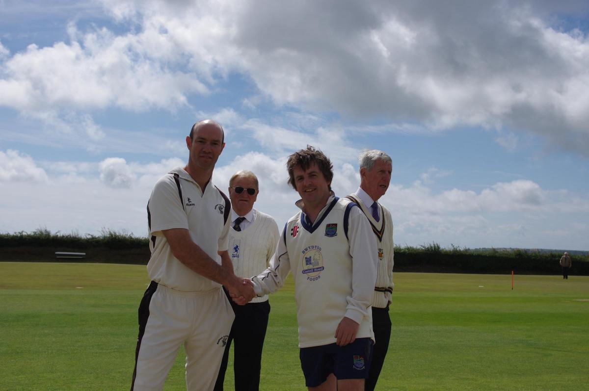Skippers Gregg Miller and Mathew Davies at the toss.