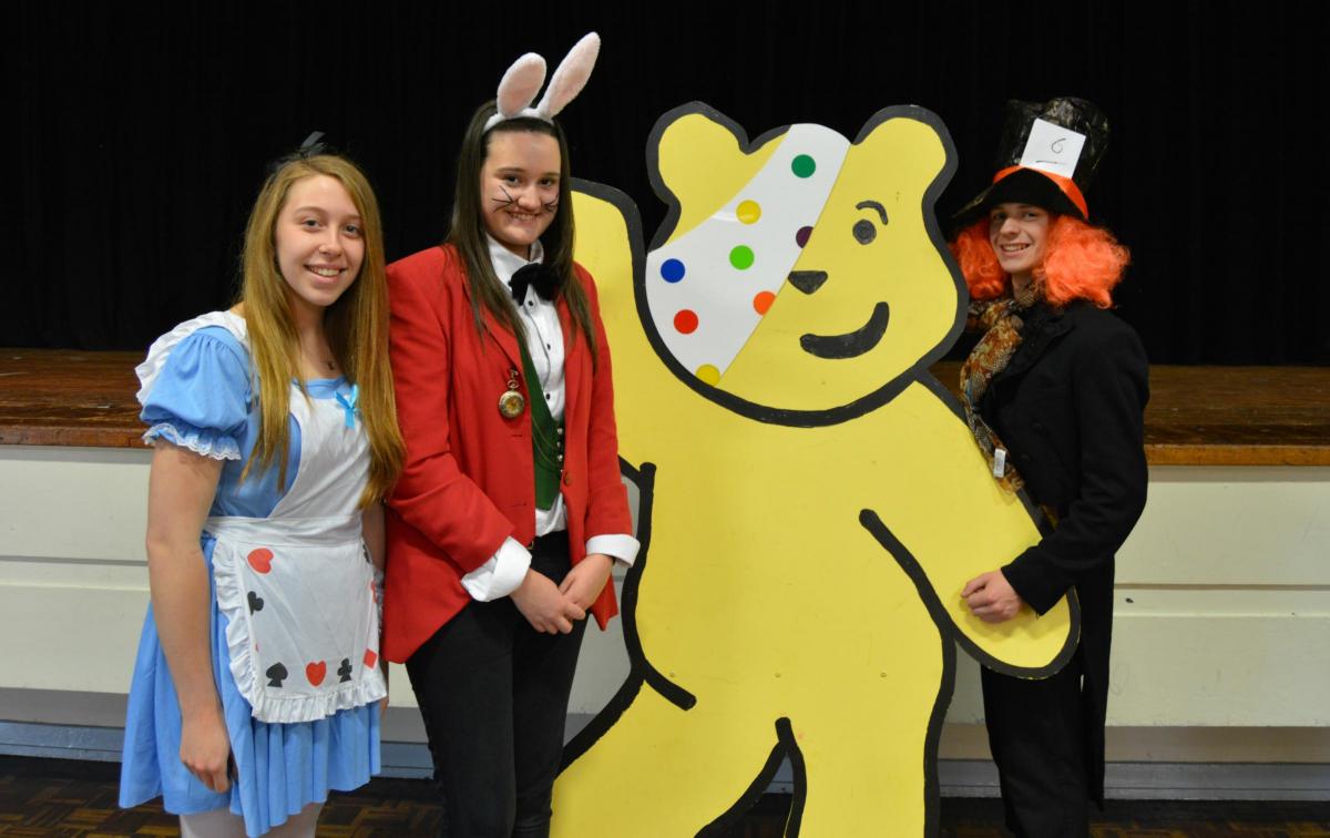 Caitlin Parr, Georgina Smith and Jonathan Wild dressed as characters from Alice in Wonderland. 
PICTURE: Western Telegraph (46227098)
