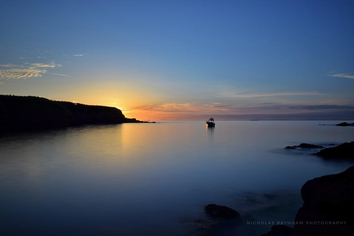 An evening walk on the coast by Nicholas Baynham