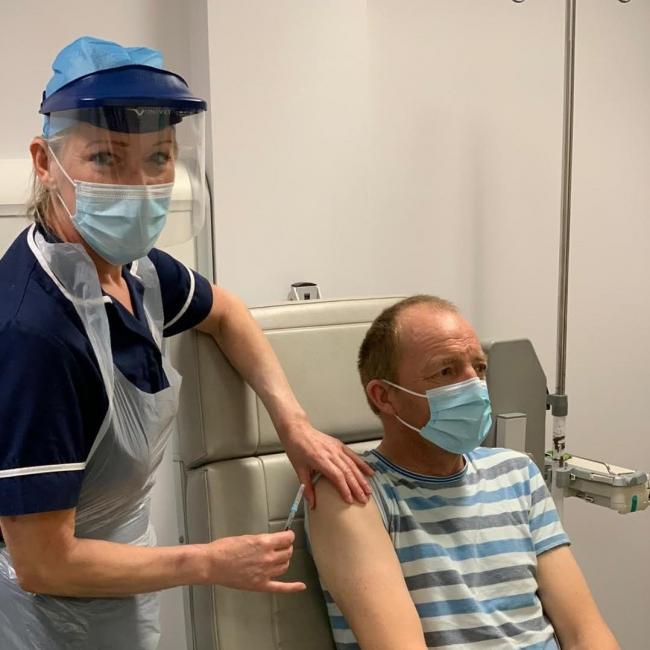 Dialysis patient Evan Evans from Llandysul receives his first vaccine dose