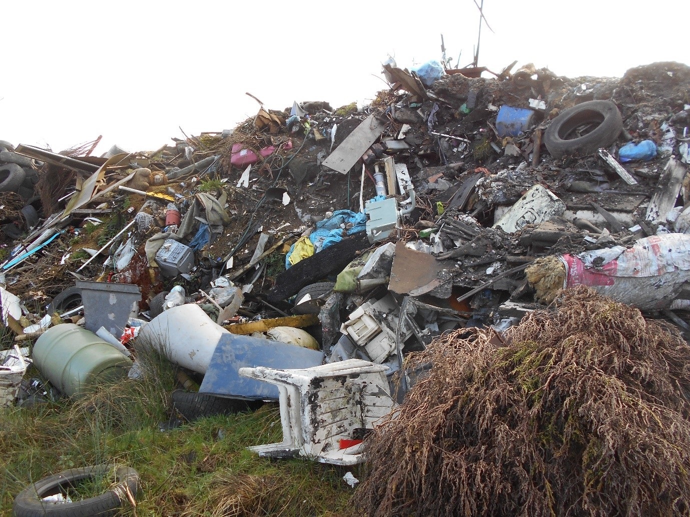 Natural Resources Wales discovered rubbish being illegally dumped by Andrew Thomas on his Garnant farm Pictures: NRW 