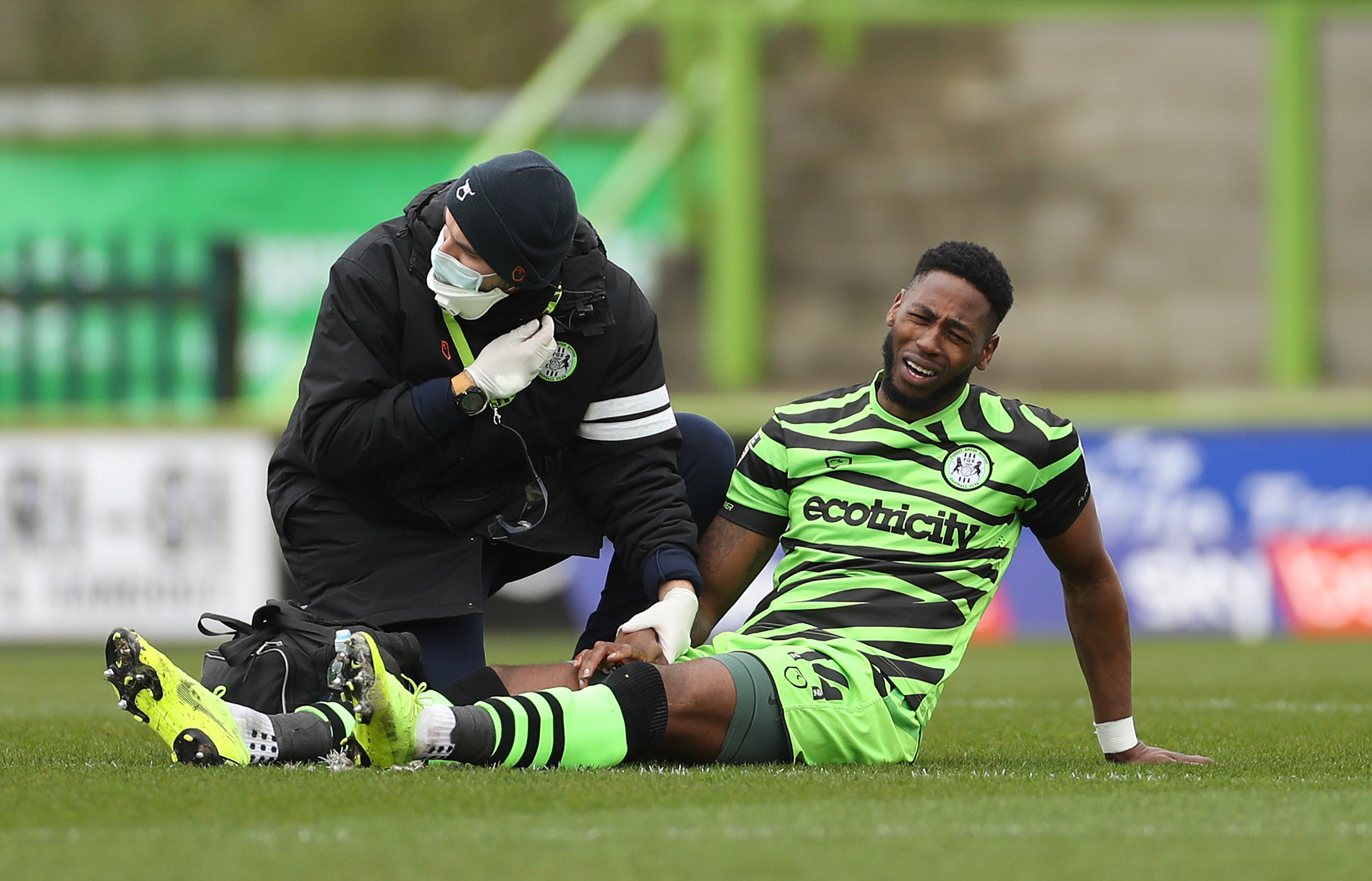 AGONY: Forest Green Rovers Jamille Matt looks on pain after his hand injury against Bolton