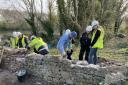 Future stonemasons help rebuild town's historic walls