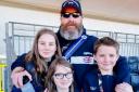 Ian Fisher and his children at the Hague Invictus Games where he achieved personal bests in all his events