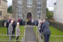 The scene outside the chapel which has served the community of Hermon since 1888.