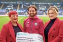 Jackie Gilderdale and Madison Owen pictured with Joe Allen