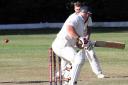Tom Mansbridge who top scored for Saundersfoot with 56 takes the wicket of Harry Phillips