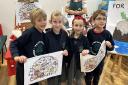 Children at Templeton School with the winning design.