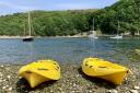 Yellow canoes in Solva