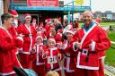 The many Santas - young and older - were in high spirits on the Santa run