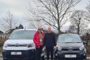 Homeless Pembrokeshire's Amanda and William with the new vehicles from GRS Motor Group.