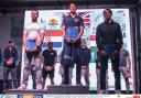 Solva's Micky Beckett takes to the podium to become a European champion. Picture: RYA British Sailing Team