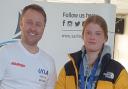 Tenby Sailing Club's Nina Marsh is pictured at the event  in Portland Harbour with one of the organisers.