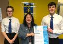 Milford Haven School headteacher Ceri-Anne Morris and pupils are pictured with the Unicef UK award.